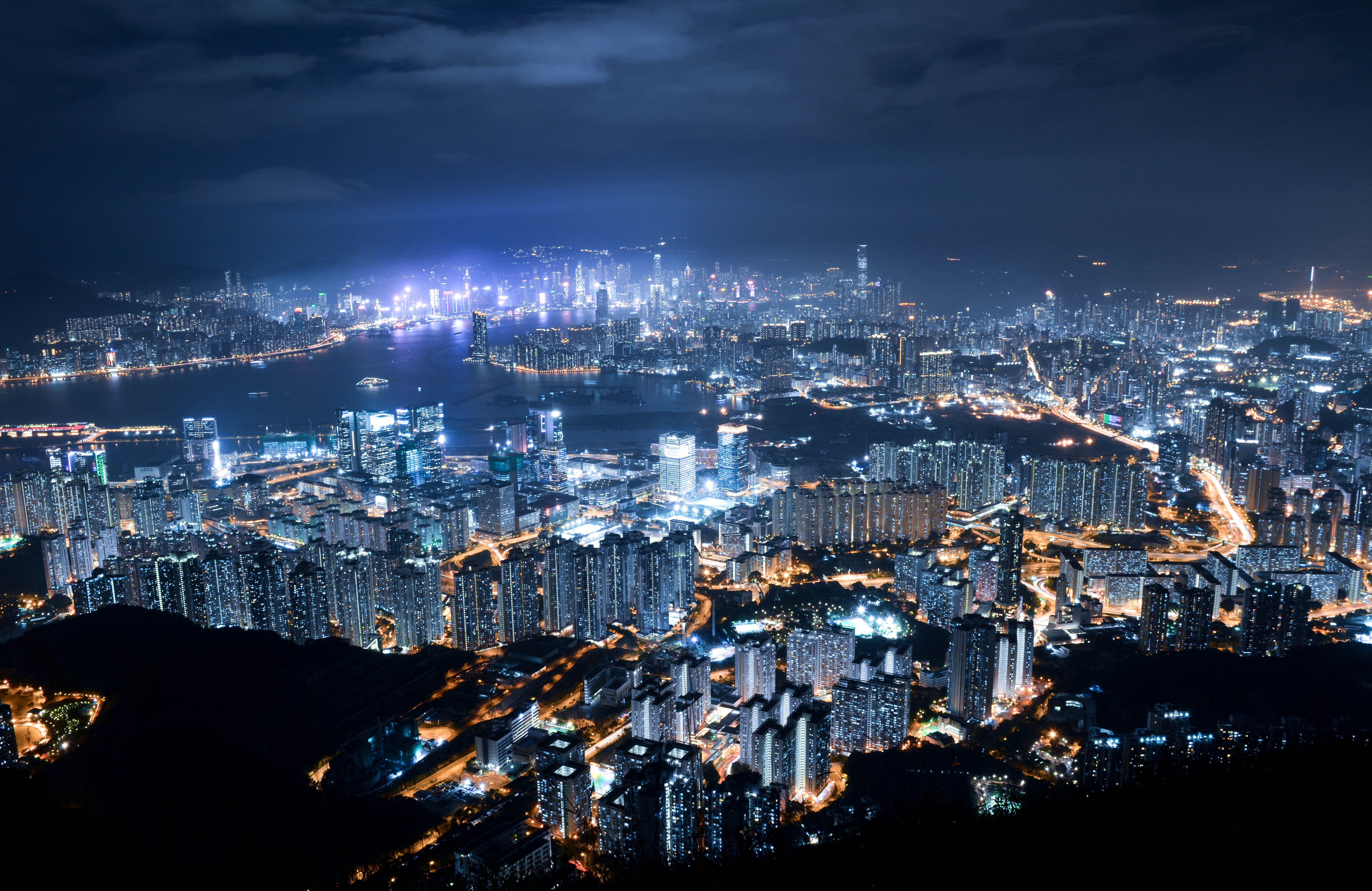 Night photo of the hong kong skyline. Skyscrapers in the background.